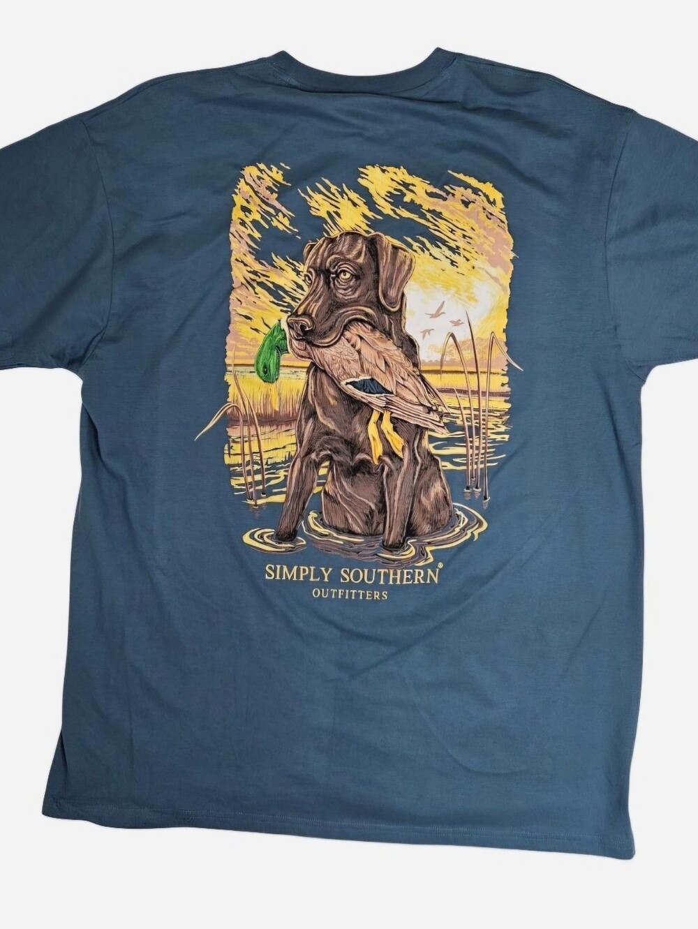 Simply Southern Outfitters blue t-shirt with graphic of a dog holding a duck
